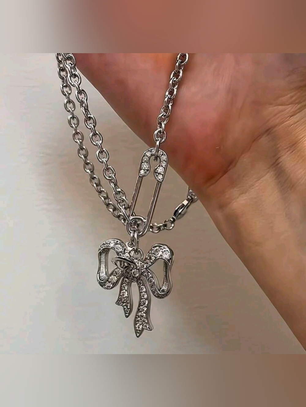 Vivienne Westwood Silver Bow Pendant Necklace with Sparkling Stones - Picture 2 of 10